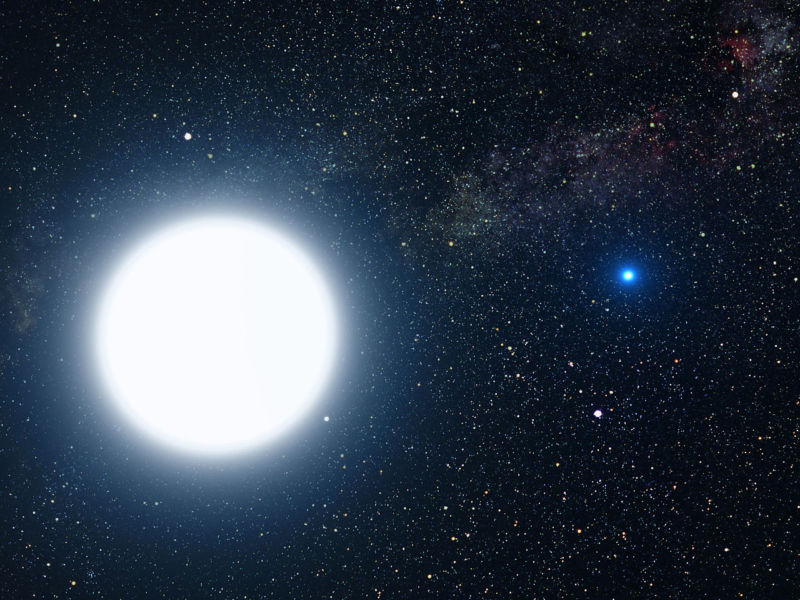 An artist's impression showing the binary star system of Sirius A and its diminutive blue companion, Sirius B.