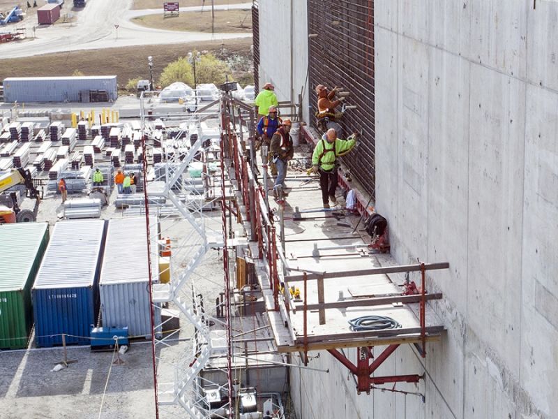 Workers on scaffolding at the MOX facility.