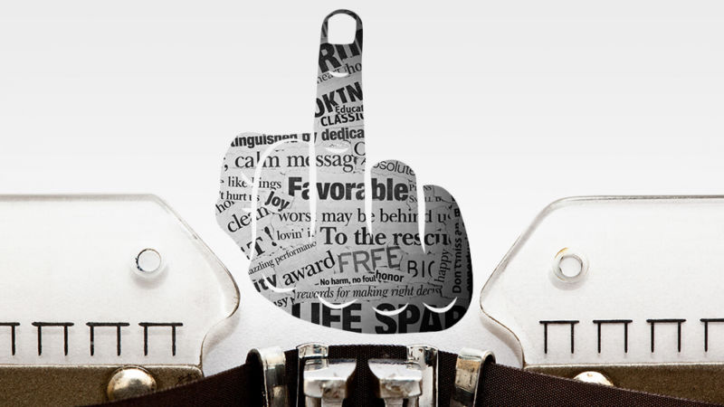 A piece of paper comes out of a typewriter, and the text on it creates the shape of a human hand extending its middle finger.