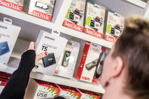 A customer looking at a portable hard drive for sale at the Raspberry Pi Store