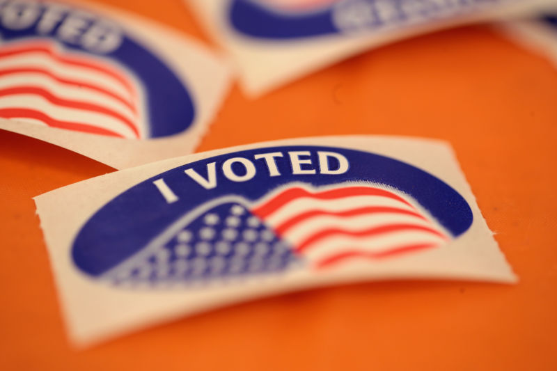 Stickers await residents who vote at the Parks and Recreation Center building on August 14, 2018, in Elkhorn, Wisconsin.