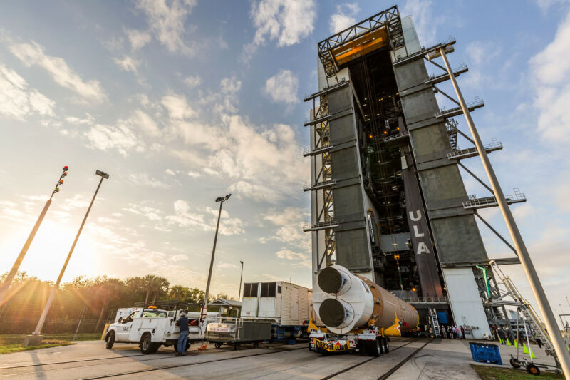 United Launch Alliance hoists its Atlas V booster onto the mobile launch platform adjacent to Space Launch Complex-41 at Cape Canaveral Air Force Station. The rocket will launch the AEHF-6 communications satellite.