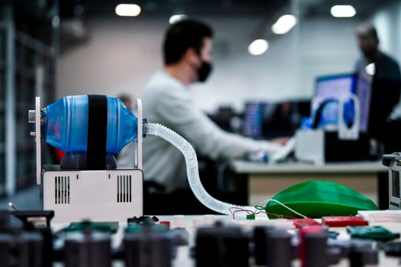 A man performs a test at a ventilator manufacturing workshop at the offices of Formon, a 3D printer manufacturer in Pristina, Kosovo on April 5, 2020.