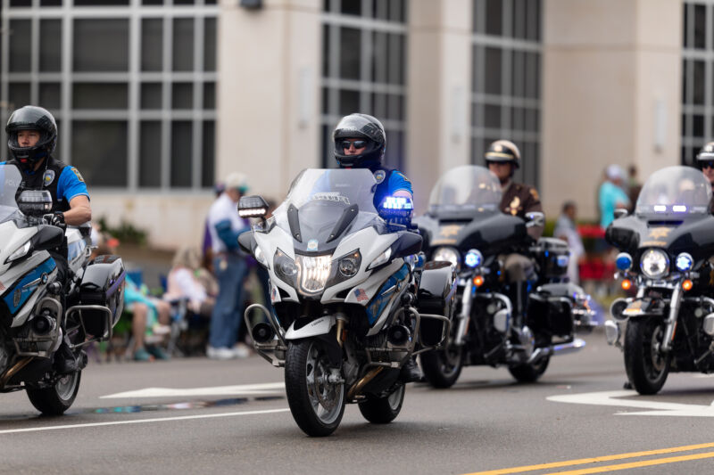 Members of the Wilmington, North Carolina, police force taking part in the city's annual Azalea Festival parade in April 2019.