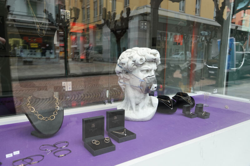 The (replica) disembodied marble head of David probably didn't need a 3M mask, but nonetheless looked fashionable sporting it in the window of a jewelry shop in Switzerland in March, 2020.