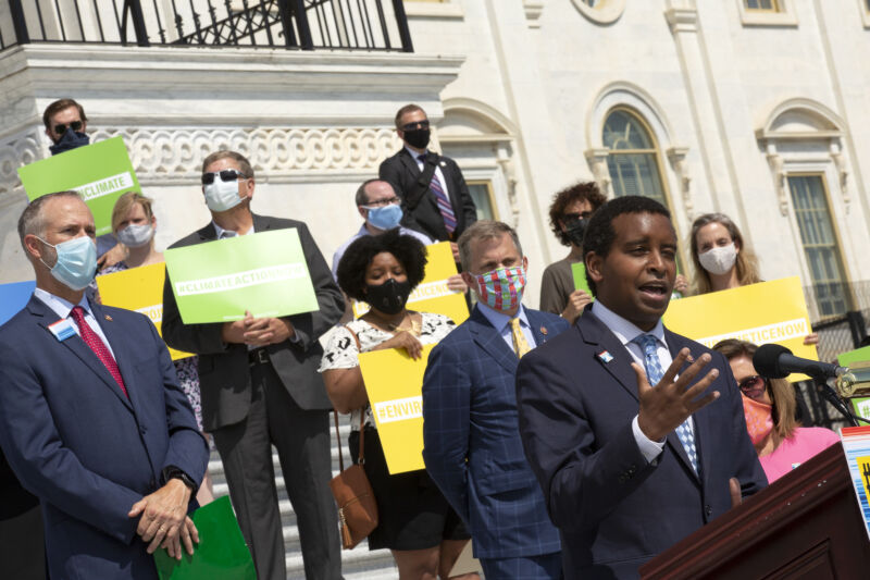 U.S. Rep. Joe Neguse (D-CO), joined by members of the Select Committee on the Climate Crisis, delivers remarks during a news conference outside the U.S. Capitol on June 30, 2020 in Washington, DC.