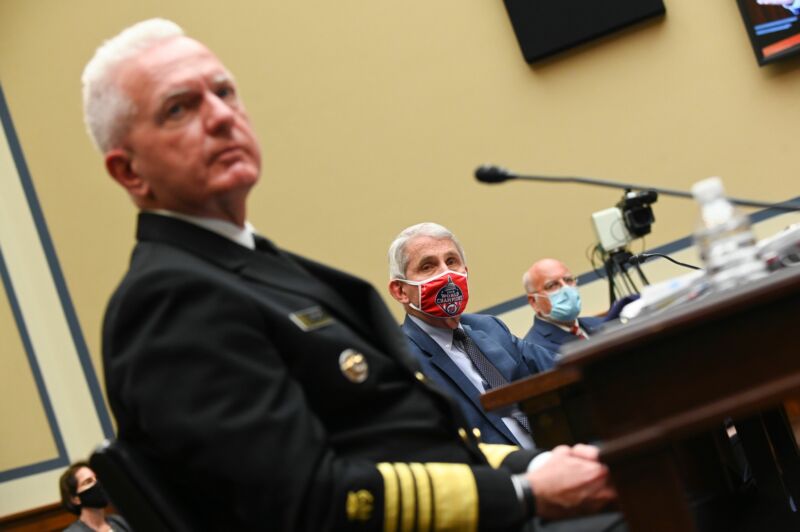 Admiral Brett Giroir, US assistant secretary for health, from left, Anthony Fauci, director of the National Institute of Allergy and Infectious Diseases, and Robert Redfield, director of the Centers for Disease Control and Prevention (CDC), listen during a House Select Subcommittee on the Coronavirus Crisis hearing in Washington, DC, July 31, 2020. 