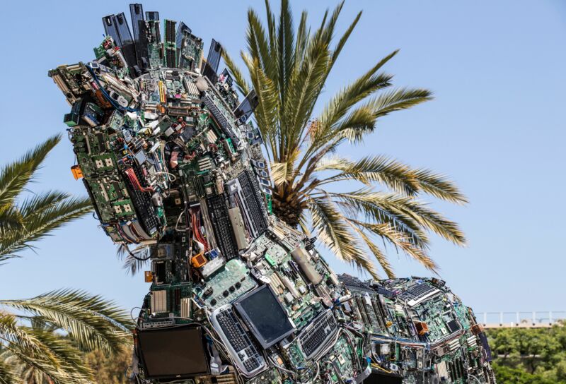 A replica of the Trojan horse made up of thousands of computer and mobile phone components infected with various viruses and malware, named the "Cyber Horse" is displayed at the entrance to the annual Cyber Week conference at the Tel Aviv University in the Israeli city of Tel Aviv on June 20, 2016.
The Cyber Horse is a piece of art composed of devices that can be harmed by malware and was created in order to prompt national and international awareness of the dangers of cyber-attacks.