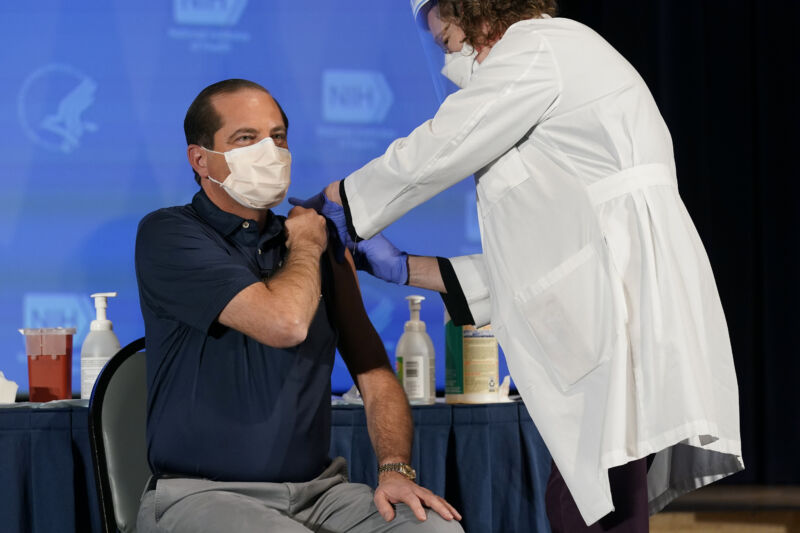 Alex Azar, secretary of Health and Human Services (HHS), who allegedly deceived states on the vaccine supply, receives the Moderna COVID-19 vaccine during an event at the NIH Clinical Center on Tuesday, December 22, 2020.