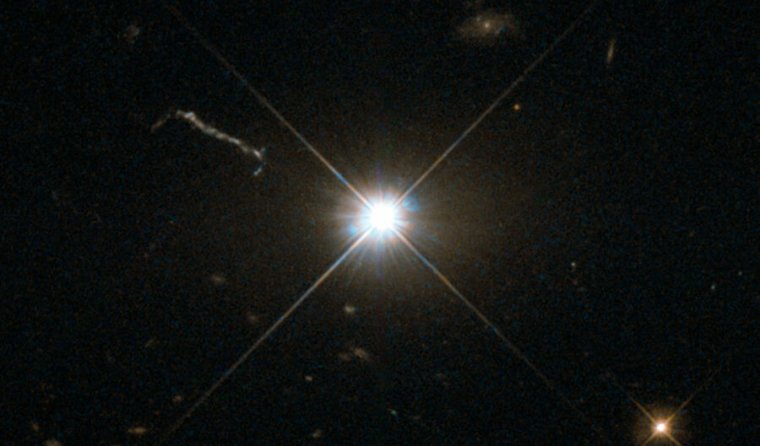Image of a bright point in a dark sky.