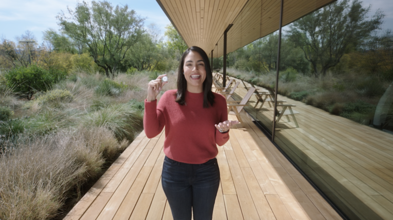 Carolyn Wolfman-Estrada, engineering program manager at Apple, presents AirTags (with one visible in her right hand).