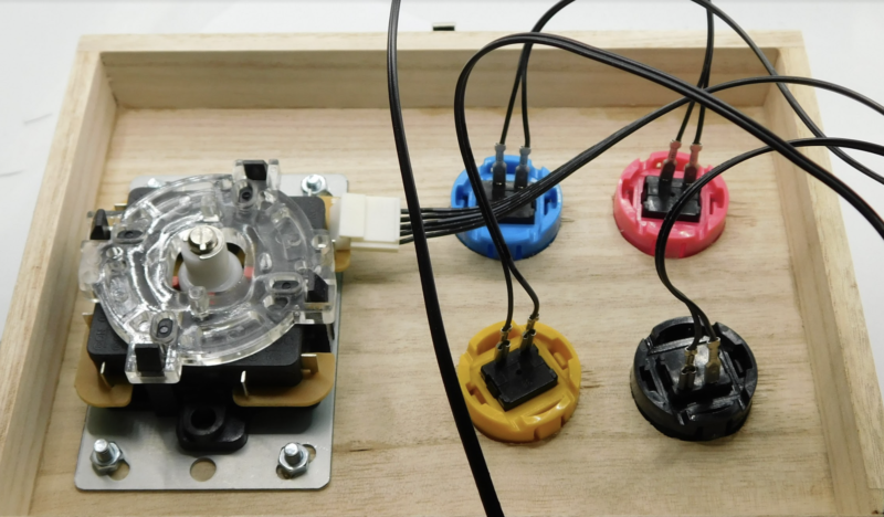 The connectors should just push onto the buttons and joysticks