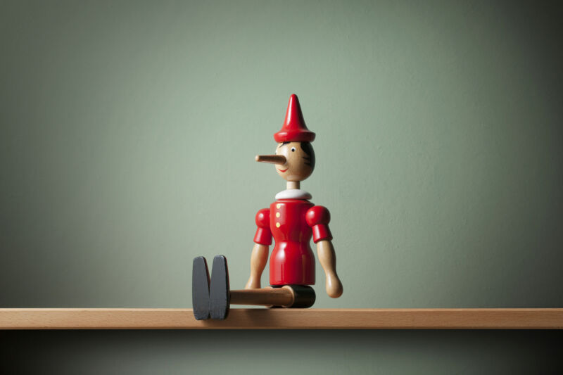 A Pinocchio doll with a long nose.