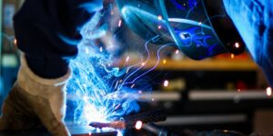 man holding grey steel frame photo