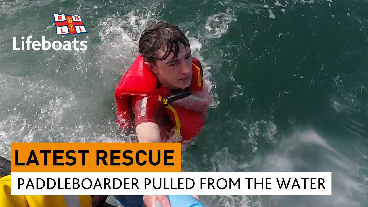 paddleboarder-saved-by-phone-pouch.jpg