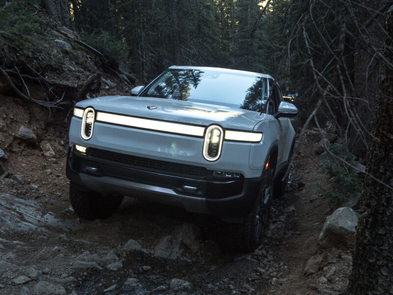 A Rivian R1T showing off its off-road capability.