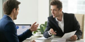 business-partners-making-negotiations-before-deal