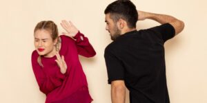 front-view-young-female-red-shirt-suffers-from-physical-threats-violence-cream-space-female-cloth-photo-violence-domestic