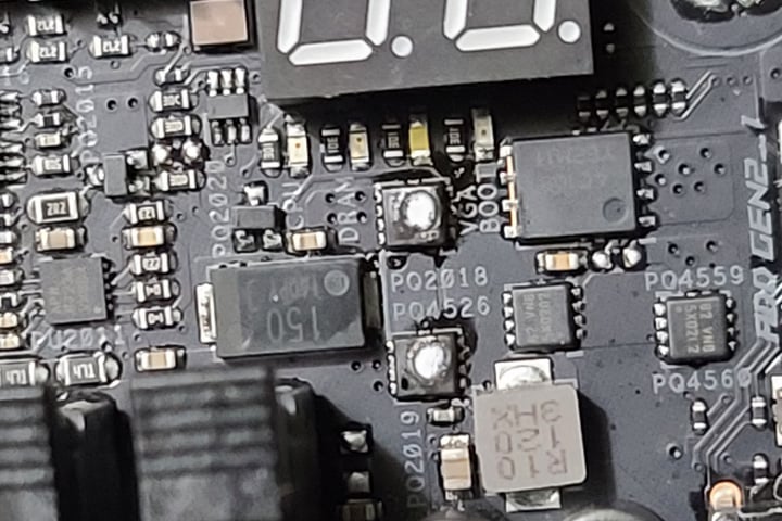 Extreme close-up photograph of damaged computer component.