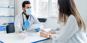 indian-doctor-receives-patient-tells-him-about-results-tests-medicine-health