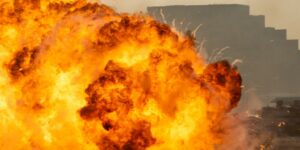 Massive fire explosion close up in military combat and war