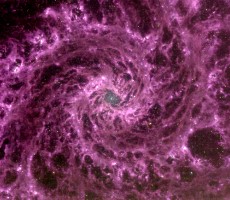 NASA's Space Telescope Shares Hypnotic Image Of Purple Galactic Swirl Chilling In Our Universe