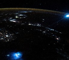 Lightning And Earth's Moon Photo-Bombed A NASA Astronaut's Spectacular Shot From Space