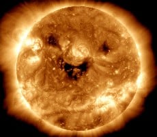 NASA's Sizzling Photo Of The Sun Smiling Looks Like The Stay-Puft Marshmallow Man On Fire