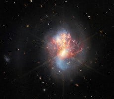 NASA's Space Telescope Captures Galaxies Colliding In A Dramatic Cosmic Merger