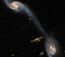 Hubble Shares Amazing Photo Of A Cosmic Bridge Linking Two Spiral Galaxies