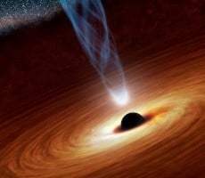 Scientists Spot A Supermassive Black Hole Violently Burping Mysterious Radio Bubbles