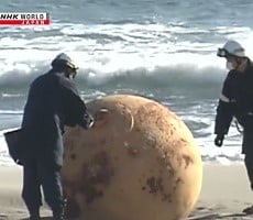 Mysterious Metal Sphere Found On A Beach Has Twitter Chirping About UFOs And Godzilla Eggs