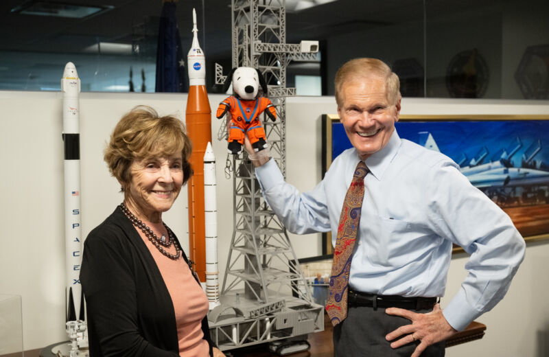 NASA Administrator Bill Nelson announces the crew of Artemis II. Just kidding. Nelson is holding the Artemis I Snoopy zero gravity indicator alongside Jeannie Schulz, widow of Peanuts gang creator Charles M. Schulz, earlier this month.