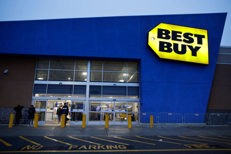 Customers exit from a Best Buy store During Black Friday sales on November 25, 2022 in Jersey City, New Jersey.