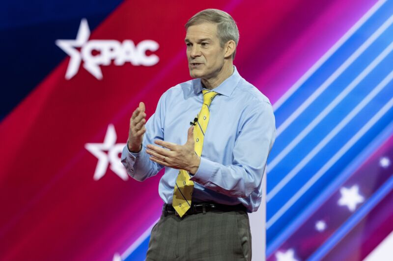 US Rep. Jim Jordan speaking on stage and gesturing with his hands at the Conservative Political Action Conference.