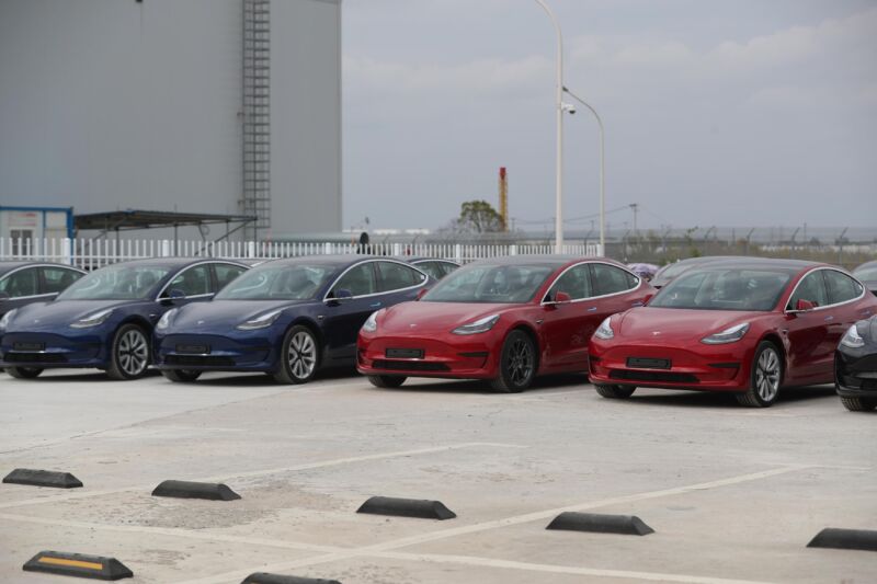SHANGHAI, CHINA - OCTOBER 26: Tesla Model 3 vehicles wait to be transported during Tesla Gigafactory Shanghai Ceremony of China-made Vehicles Exporting to Europe on October 26, 2020 in Shanghai, China. (Photo by Zhang Hengwei/China News Service via Getty Images)