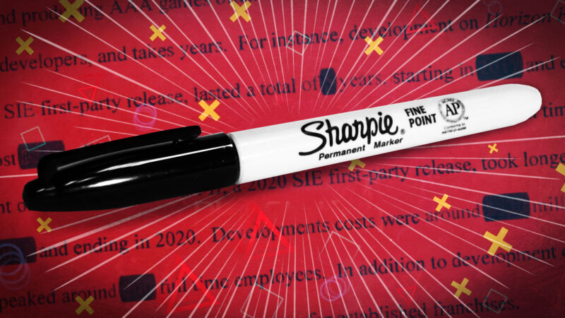 Sharpie with magic sparks shooting out, on top of redacted Sony documents