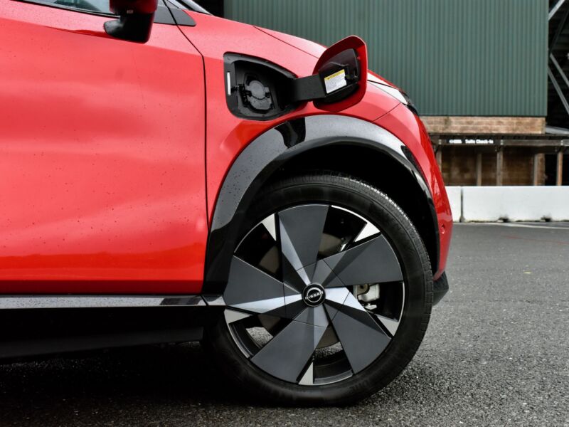 A Nissan Ariya with the charging port open