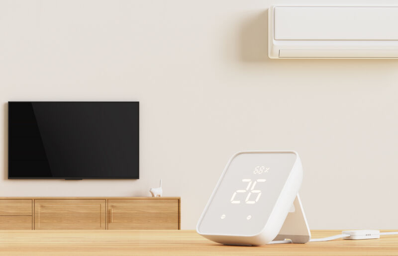 SwitchBot Hub 2 in front of mini-split and TV