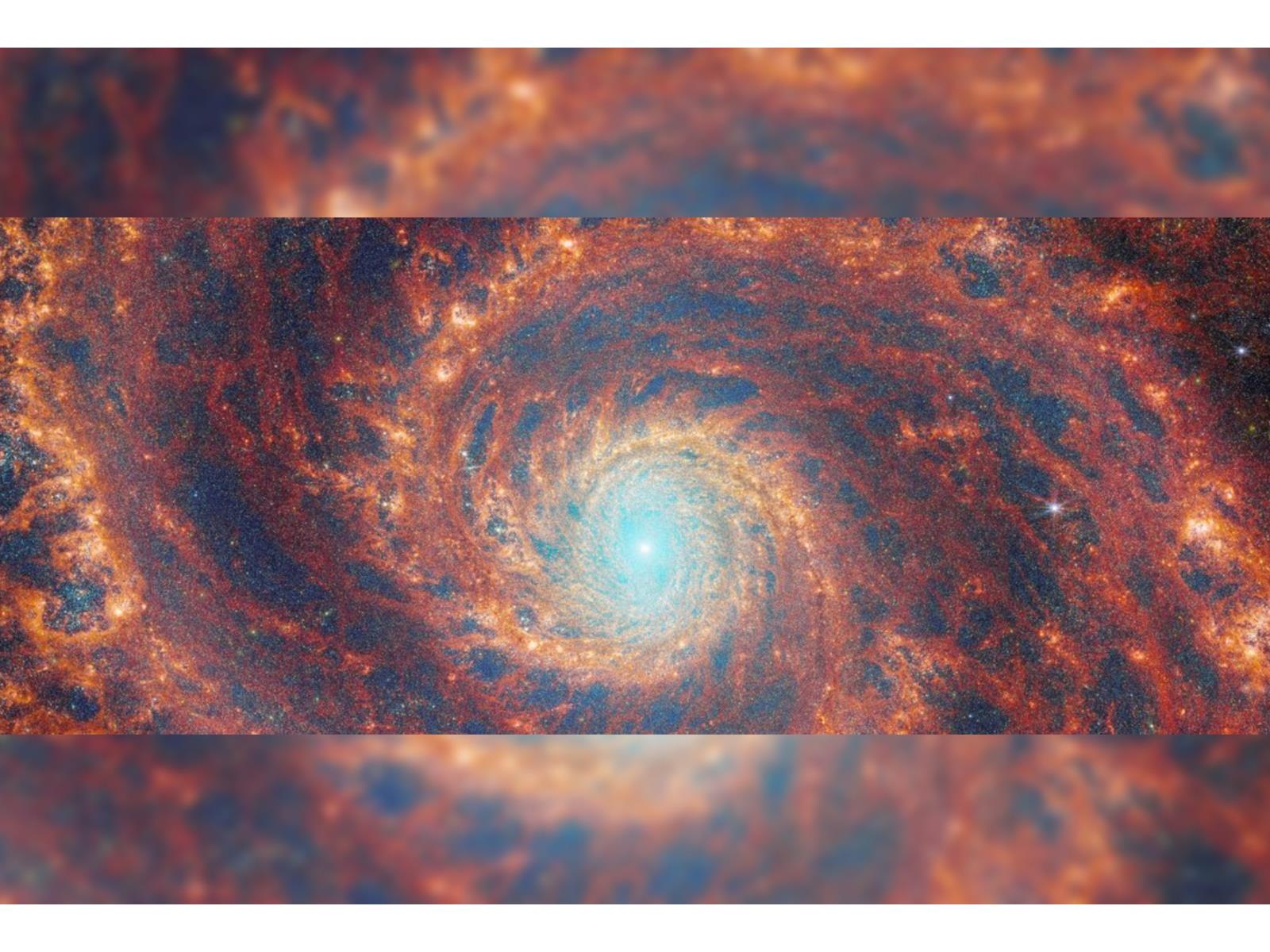 JWST's Captures Spiraling Arms Reaching Out Of A Galactic Whirlpool And It's Mesmerizing