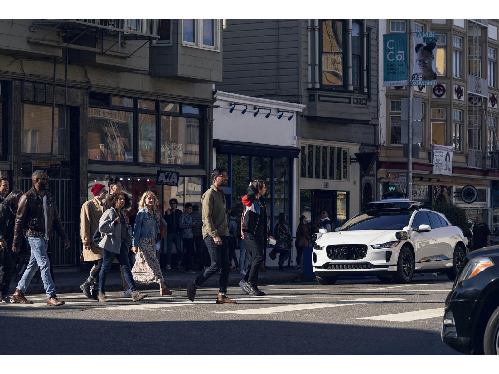 Why Protestors On E-Bikes Are Using Traffic Cones To Paralyze Stop Self-Driving Cars