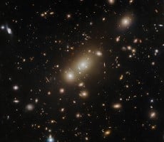 Hubble Space Telescope Captures Wild Galaxy Clusters That Are Gravitationally Warped