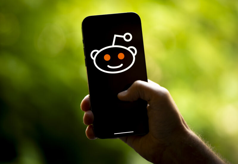 Reddit logo on a smartphone