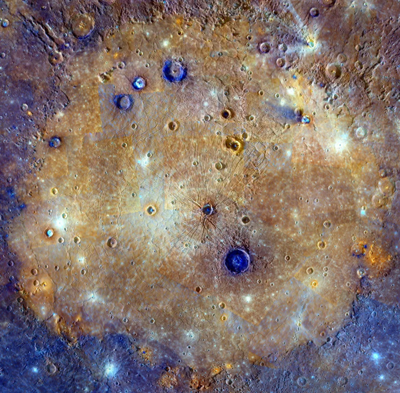 Image of a crater featuring relatively light-colored rock, and filled with smaller craters.