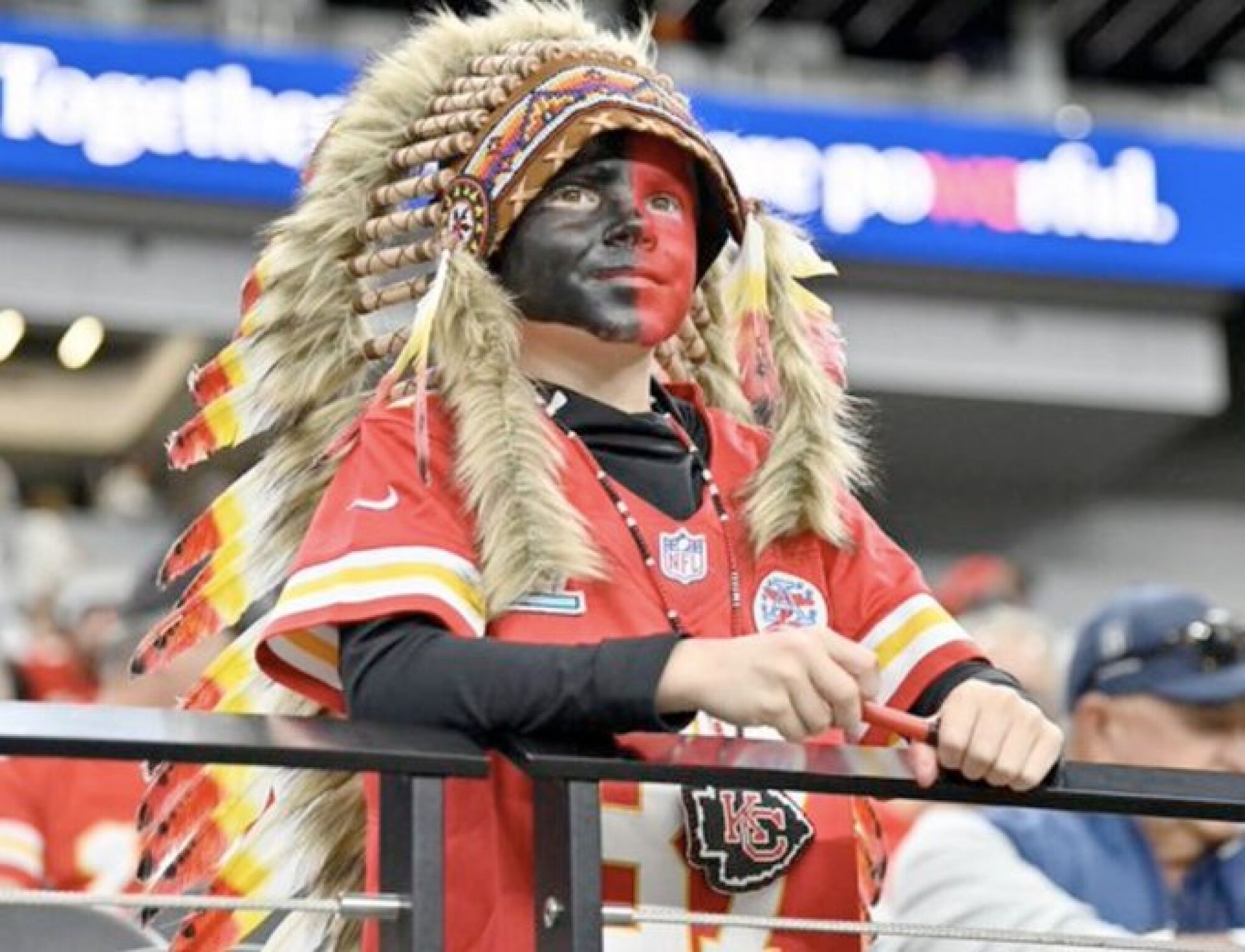 Chiefs fan in headdress and face-paint
