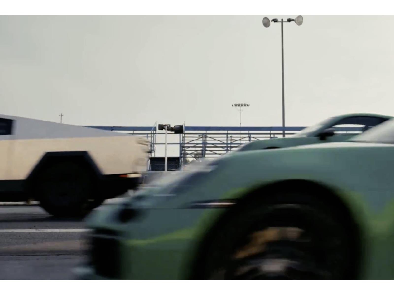 Watch Tesla’s Cybertruck Beat A Porsche 911 In A Drag Race...While Towing A Porsche