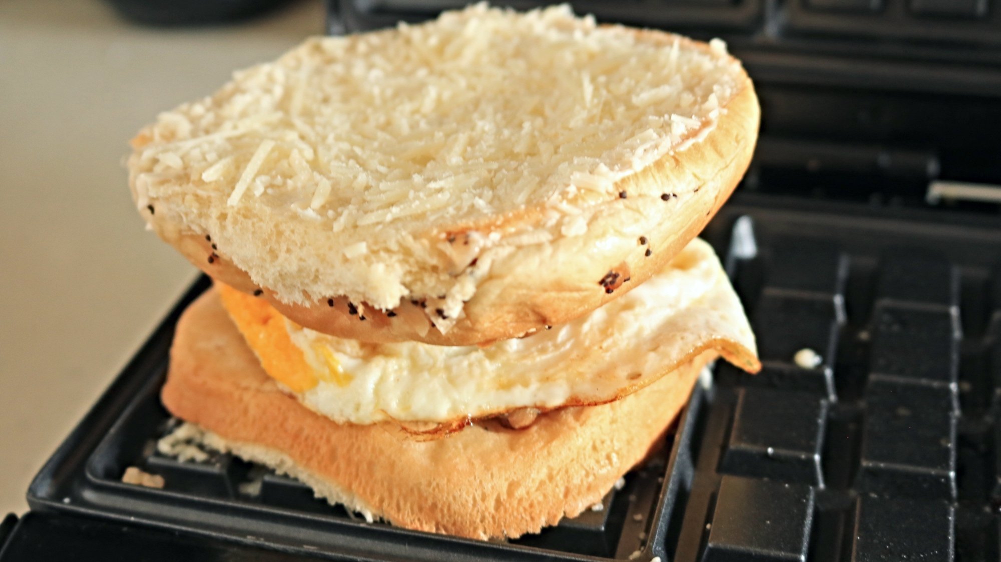 Egg sandwich in a waffle iron.