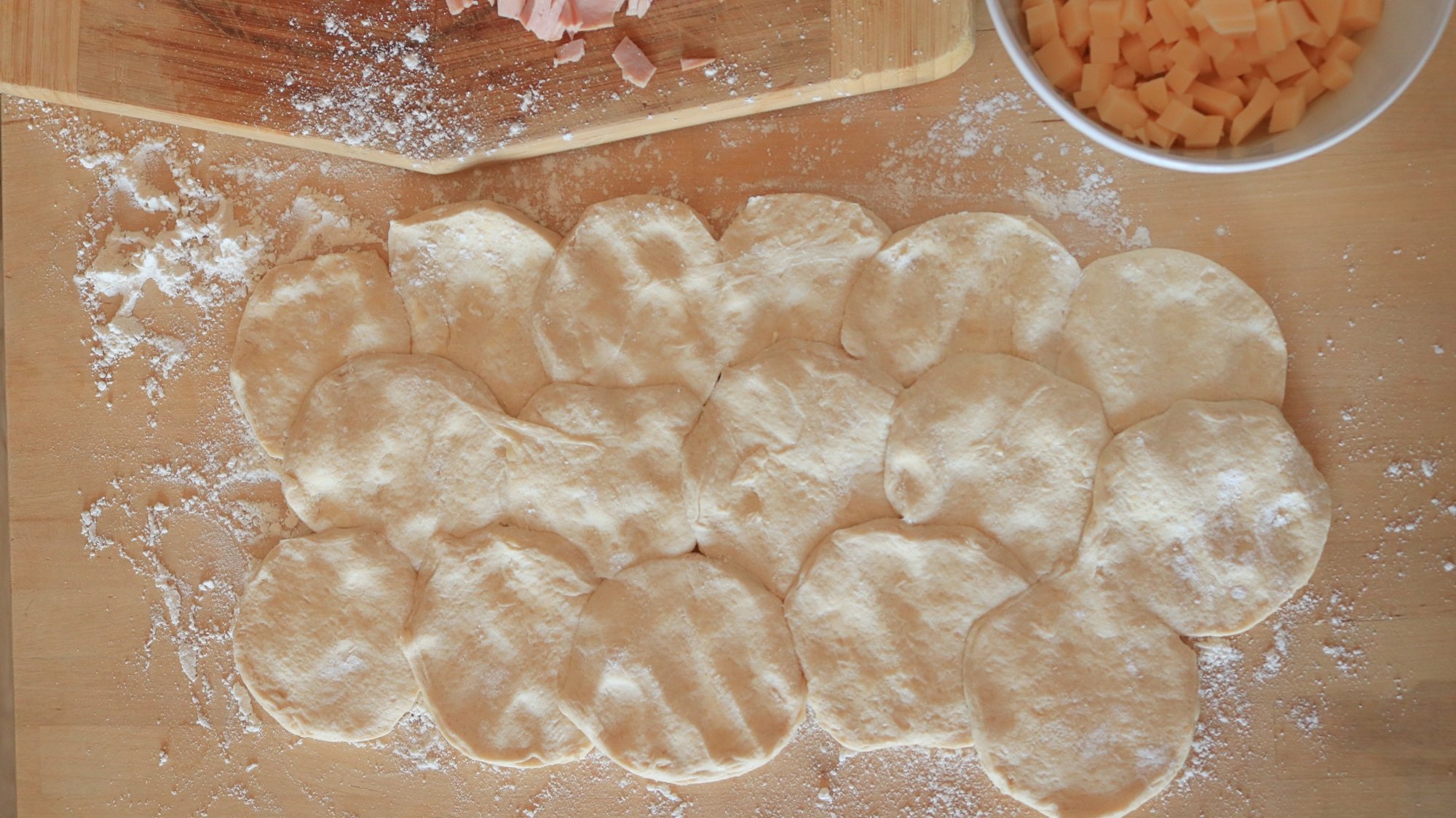 Biscuit dough shingled into a rectangular sheet.
