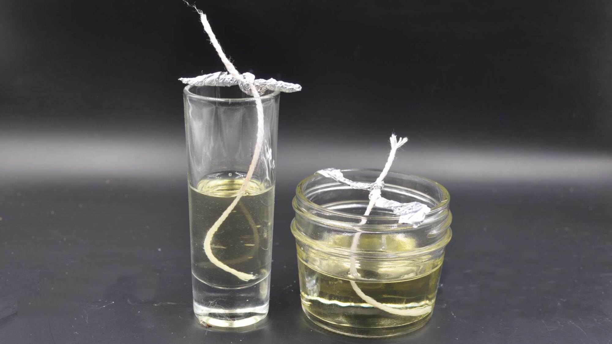 make candles out of oil, cotton butchers cord and shot glasses or small jars