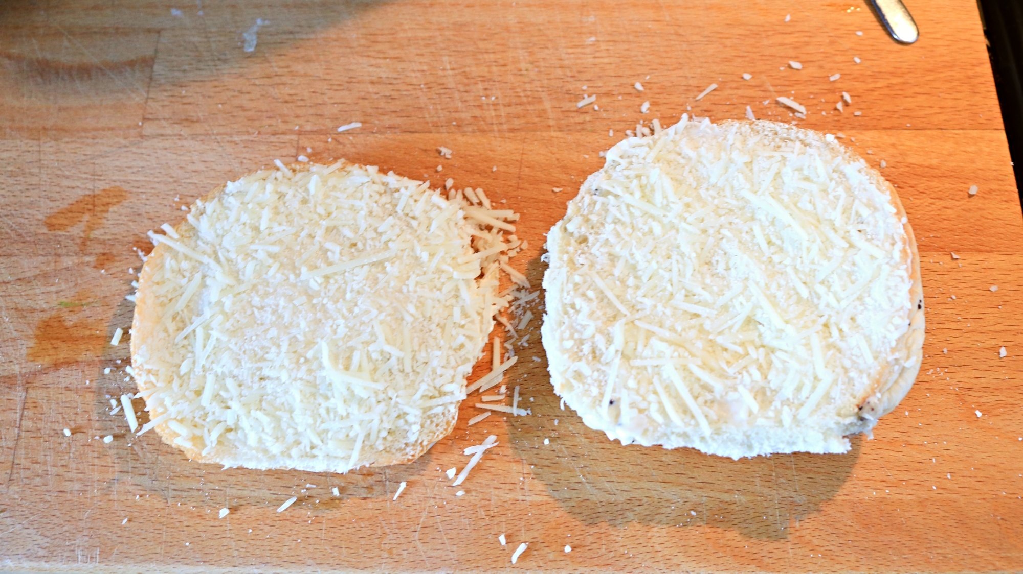 Bread with shredded cheese on top